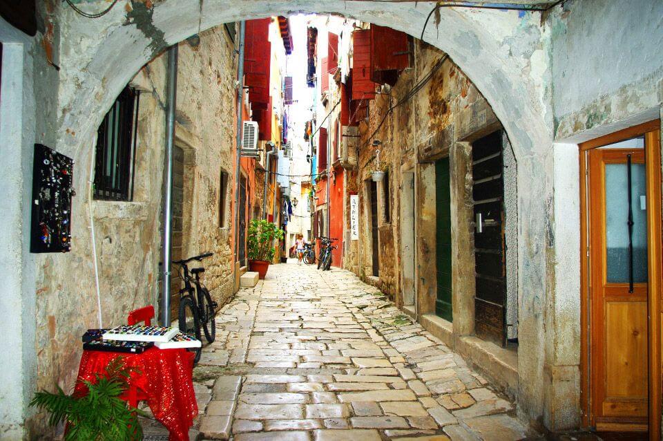 Quiet stone alley with local charm in Rovinj, Croatia - ideal for budget-friendly guesthouse stays